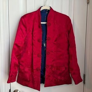 Measures 18’ across chest, 26’ shoulder to hem.